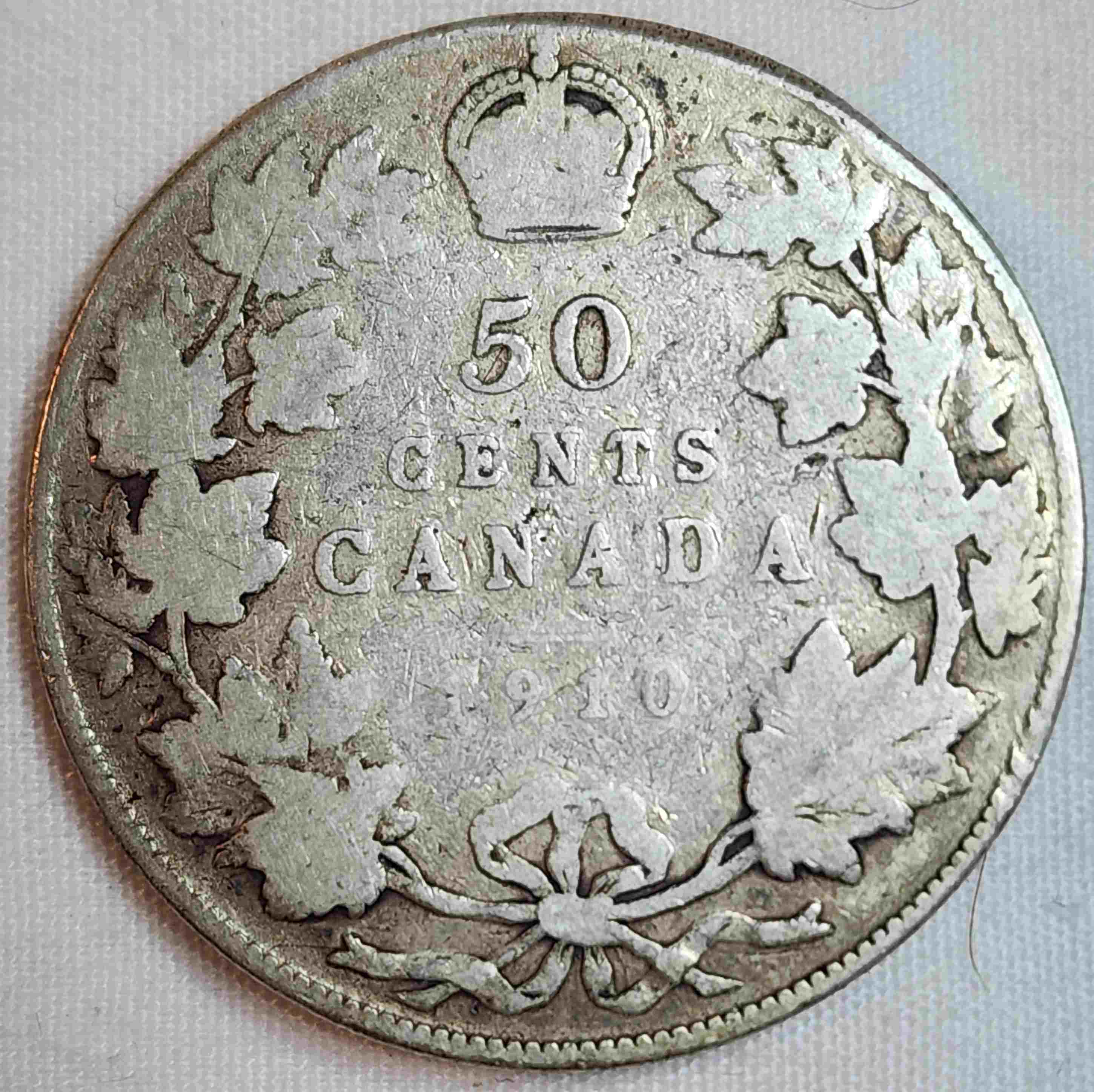 Anyway-To-Tell-Which-Leaves-These-2-Ag-1910-50-Cent-Pieces-Are?
